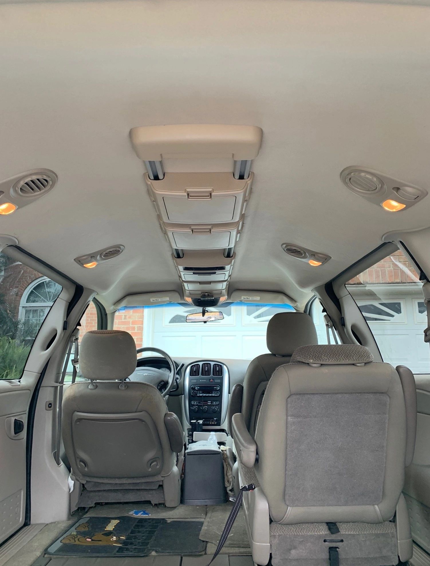 Completed vehicle headliner after mobile replacement work