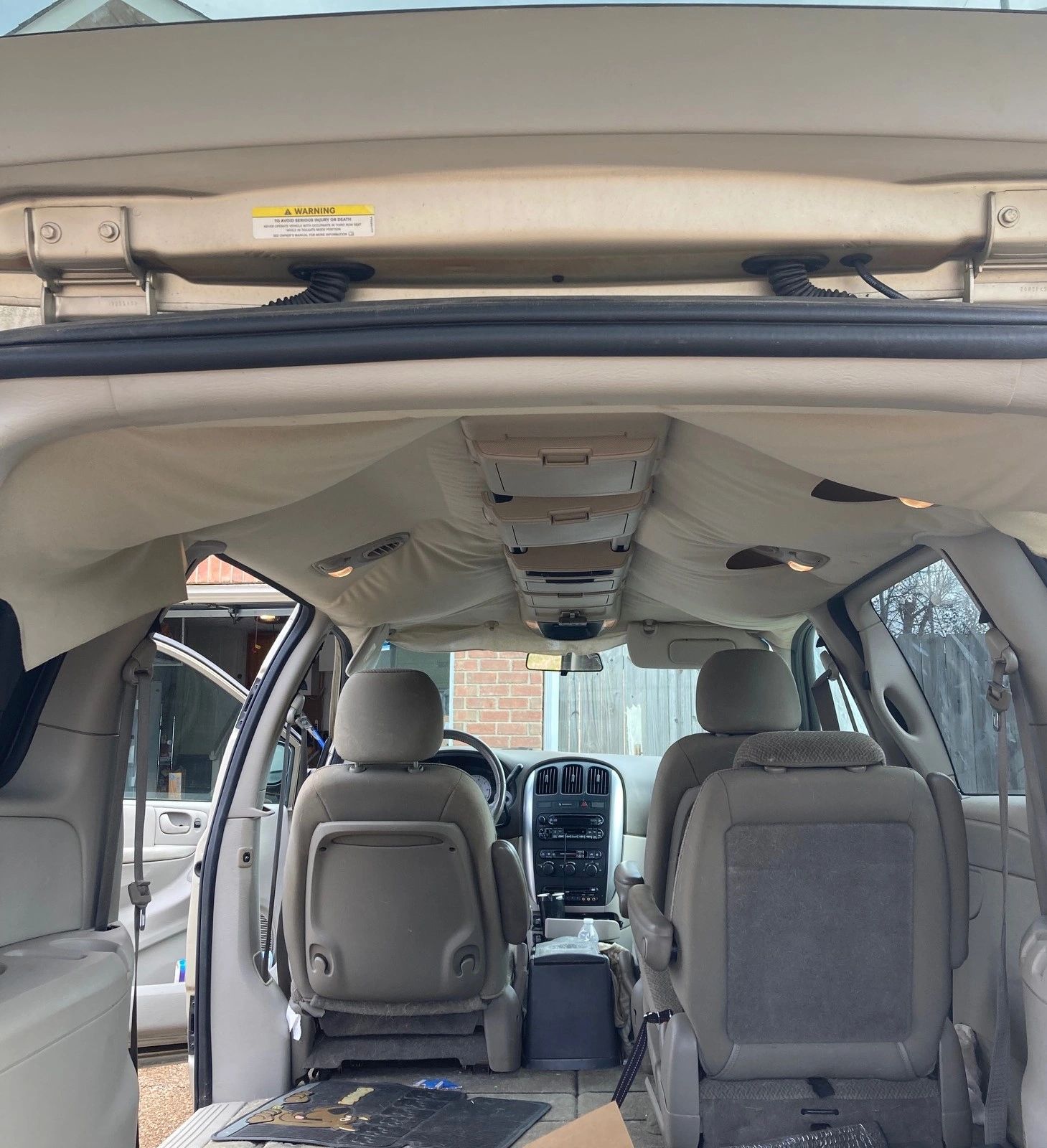 Vehicle headliner before replacement work